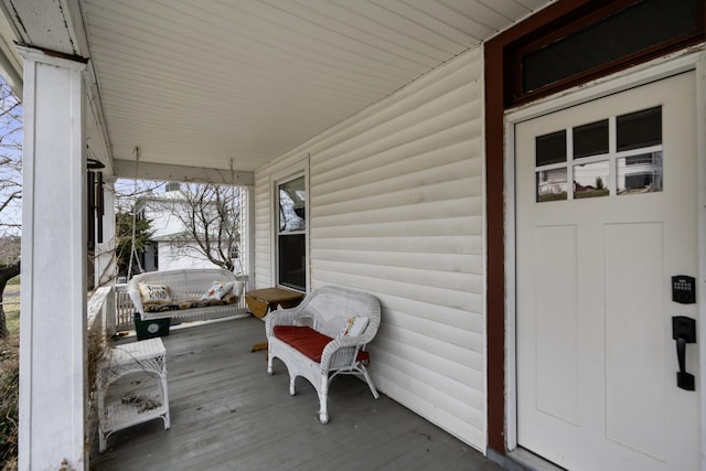 deck with covered porch