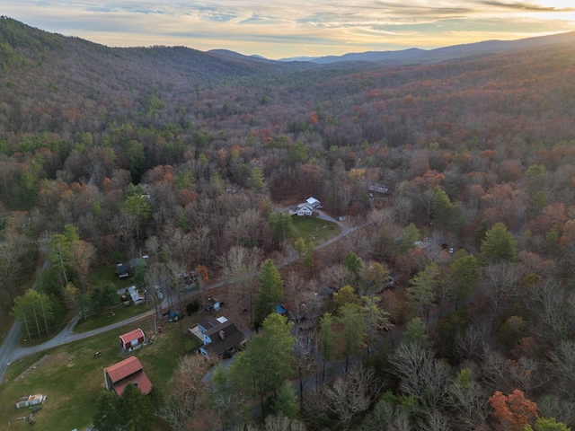 aerial view at dusk with a mountain view