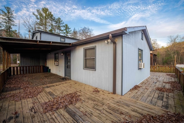 exterior space with a wooden deck and cooling unit