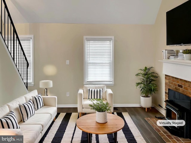 living room featuring dark wood-type flooring