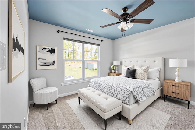 bedroom with visible vents, carpet, and baseboards