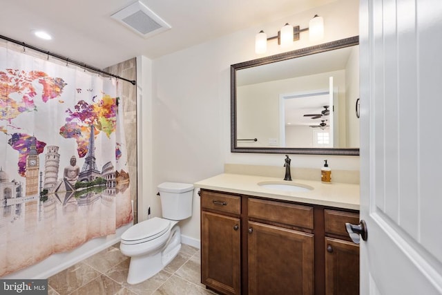 full bath featuring vanity, toilet, shower / bath combination with curtain, baseboards, and visible vents
