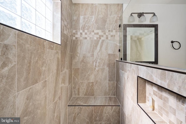 bathroom with a fireplace and a walk in shower
