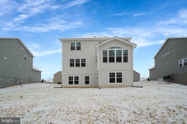 view of snow covered house