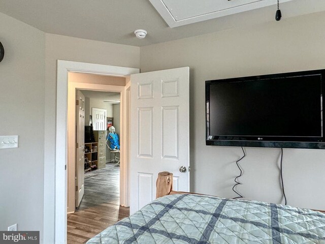 bedroom featuring hardwood / wood-style floors