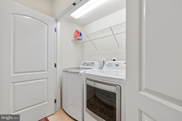 laundry room featuring laundry area and independent washer and dryer