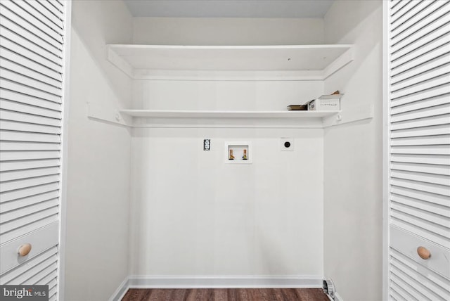 washroom with washer hookup, dark wood finished floors, hookup for an electric dryer, laundry area, and baseboards