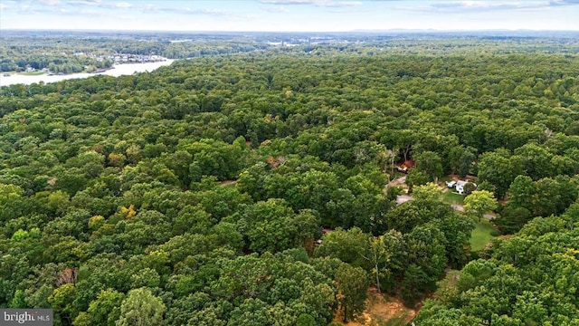 aerial view featuring a view of trees