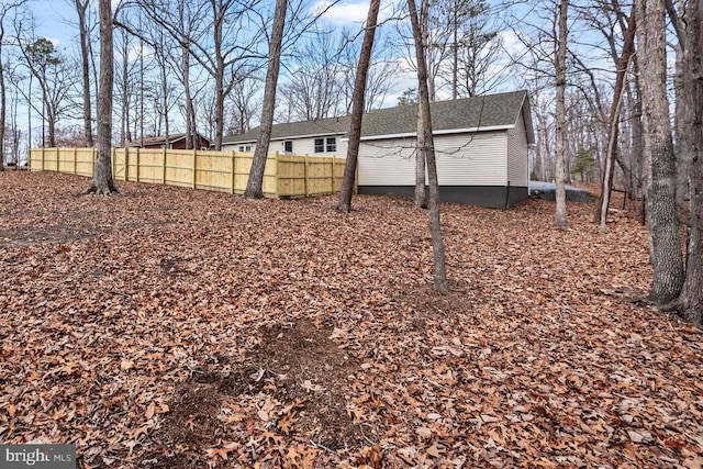 view of yard featuring fence