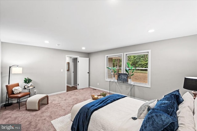 carpeted bedroom with recessed lighting and baseboards