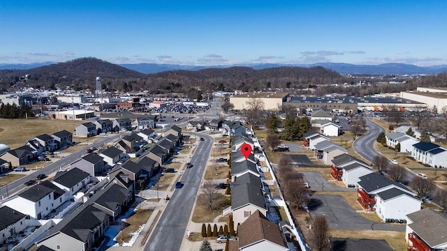 birds eye view of property with a residential view and a mountain view