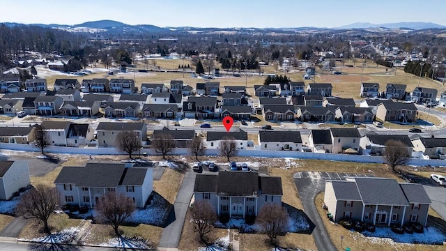 drone / aerial view with a residential view and a mountain view