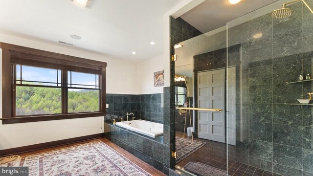 bathroom with plus walk in shower