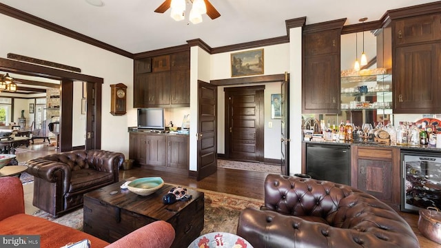 living room featuring ceiling fan, bar, dark hardwood / wood-style floors, wine cooler, and ornamental molding