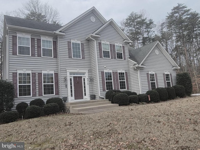 view of front of house with a front lawn