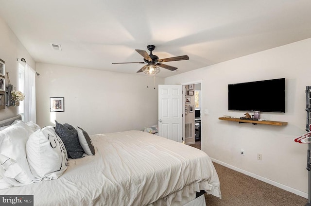 bedroom with a ceiling fan, carpet, visible vents, and baseboards