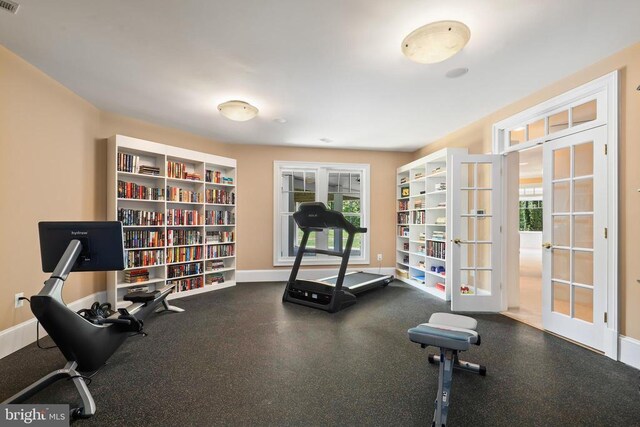 exercise area featuring french doors