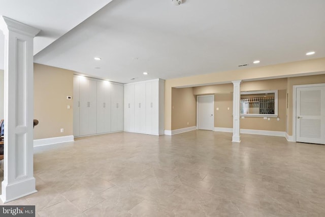 below grade area featuring baseboards and recessed lighting
