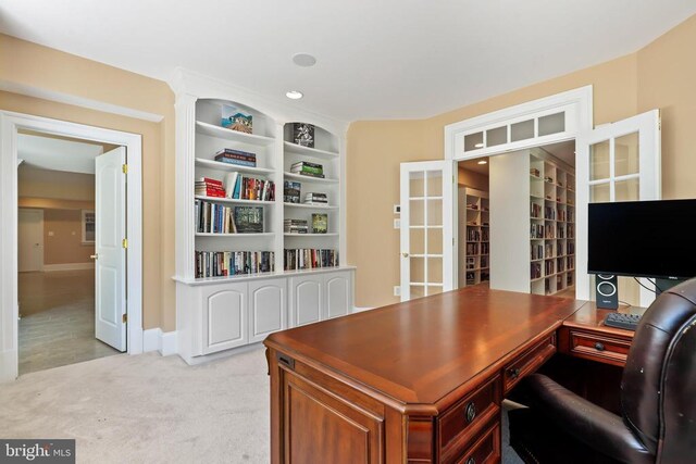 home office featuring light carpet