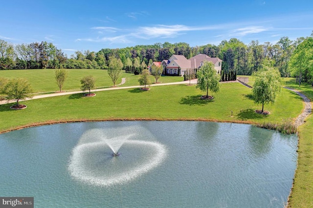 surrounding community with a yard and a water view