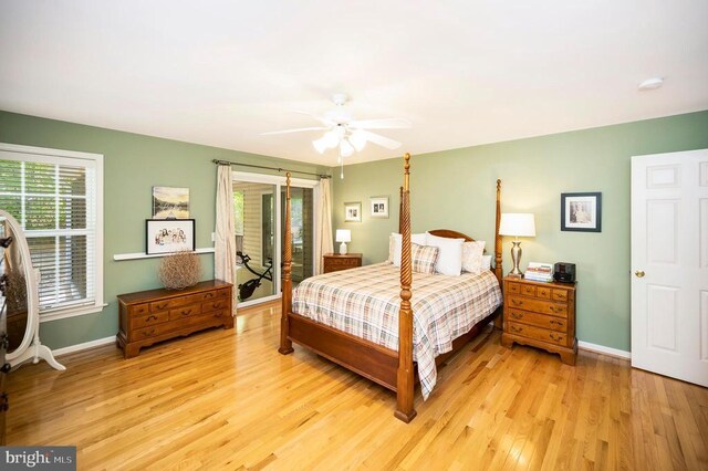 bedroom with baseboards, ceiling fan, light wood-type flooring, and access to outside