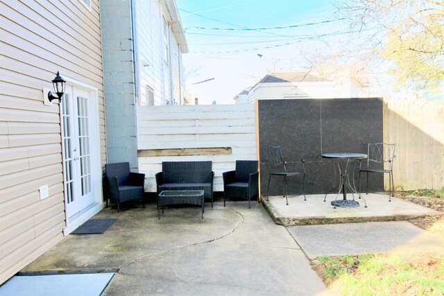 view of patio / terrace featuring outdoor lounge area and french doors