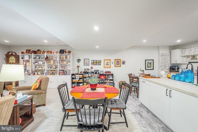dining space with recessed lighting