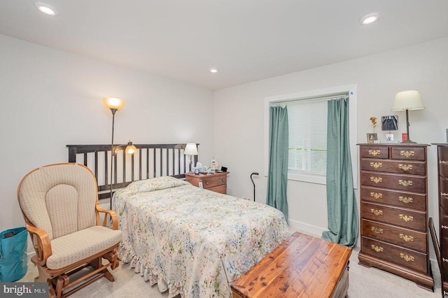 carpeted bedroom featuring recessed lighting
