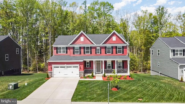 view of front facade featuring concrete driveway, an attached garage, a porch, and a front yard