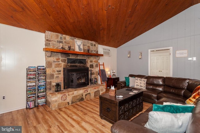 living room featuring wood ceiling, lofted ceiling, hardwood / wood-style floors, and an AC wall unit