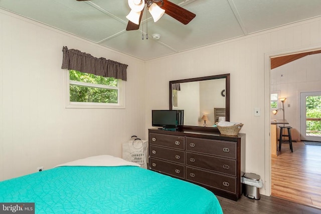 bedroom featuring ceiling fan and dark hardwood / wood-style flooring