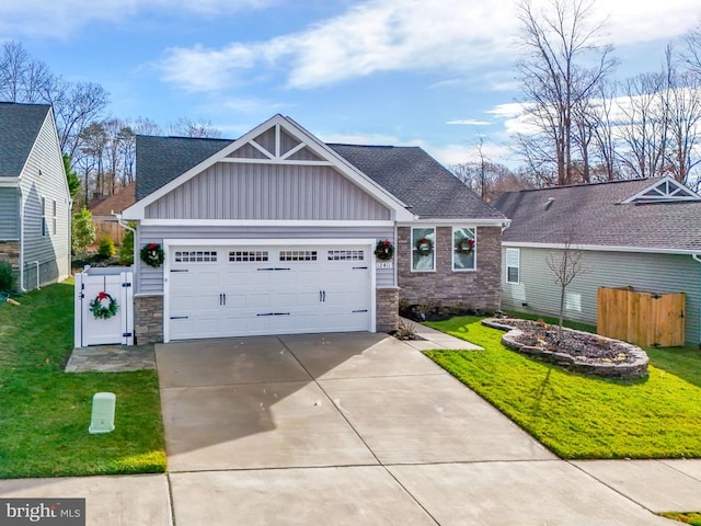 craftsman-style house with a garage and a front yard