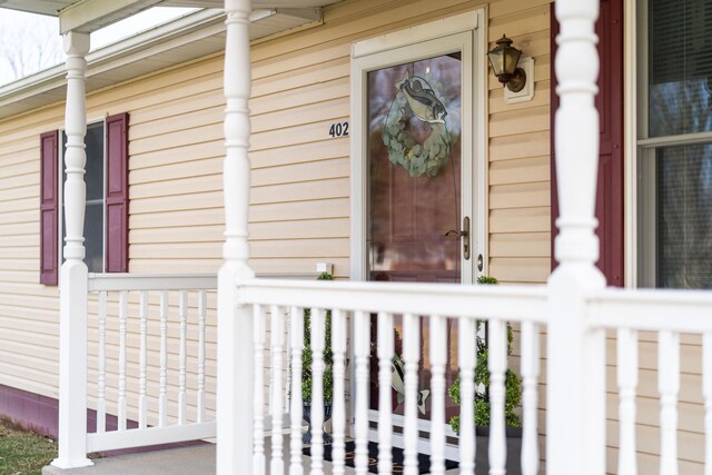 doorway to property with covered porch