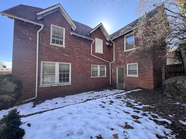 view of snow covered property