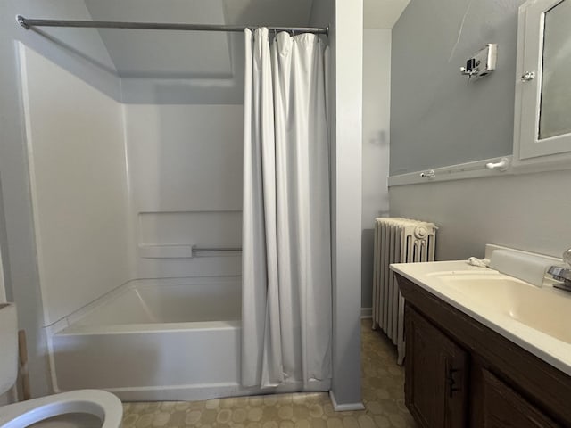 full bathroom with radiator heating unit, toilet, shower / tub combo, and vanity