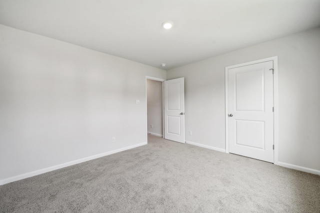 unfurnished bedroom featuring carpet