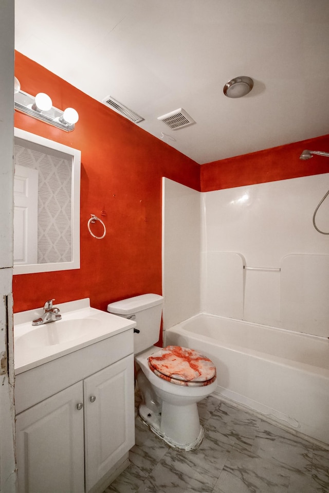 full bathroom featuring bathing tub / shower combination, vanity, and toilet