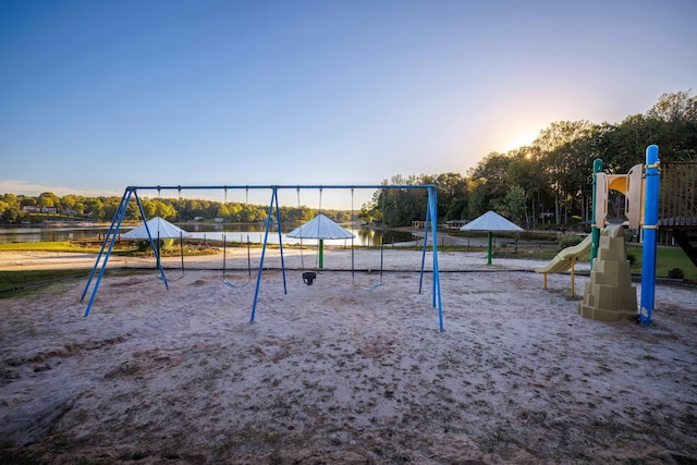 view of jungle gym with a water view