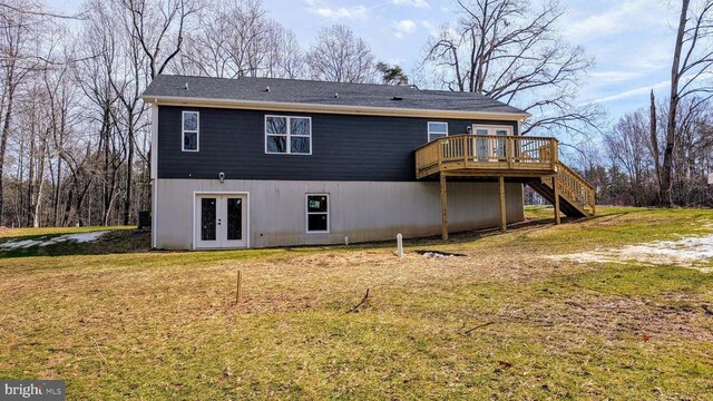 back of house featuring french doors, a yard, and a wooden deck