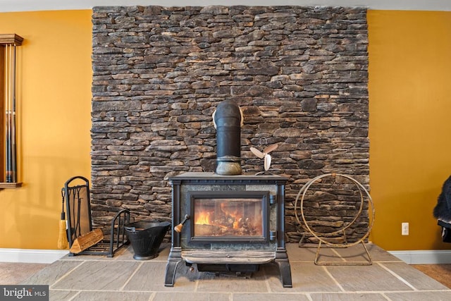 room details featuring a wood stove