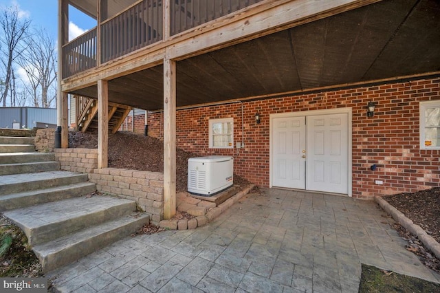 view of patio / terrace featuring stairs