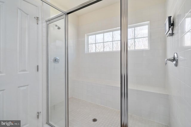 bathroom featuring a stall shower