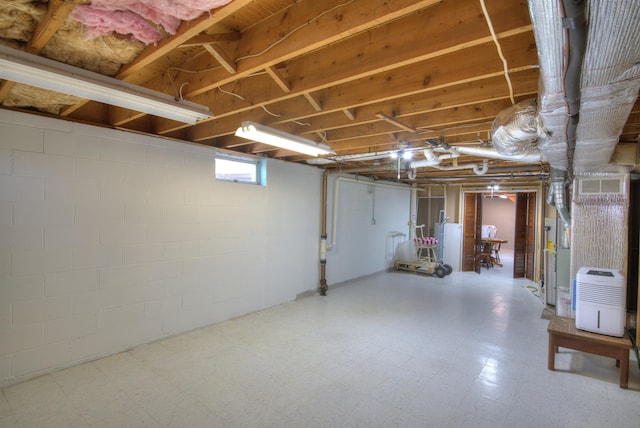 basement featuring tile patterned floors