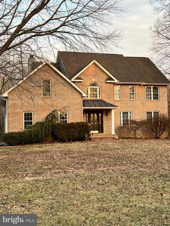 view of property with a front yard