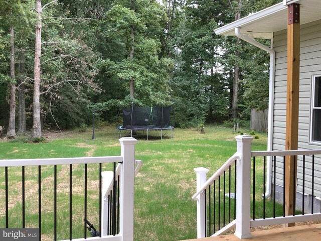 view of yard featuring a trampoline