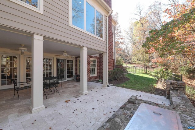 view of patio / terrace featuring ceiling fan