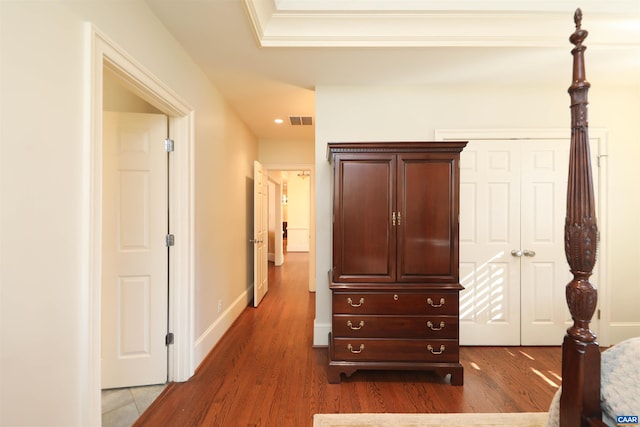 corridor featuring dark hardwood / wood-style flooring