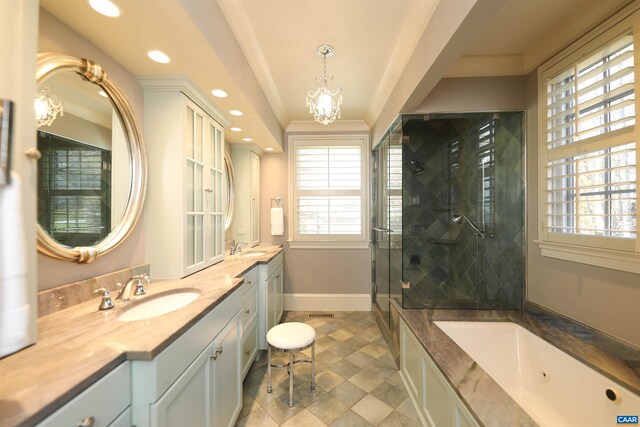 bathroom with ornamental molding, vanity, independent shower and bath, and a notable chandelier