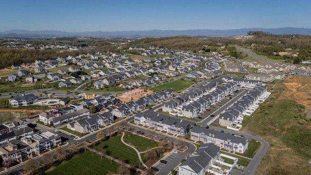 drone / aerial view featuring a mountain view