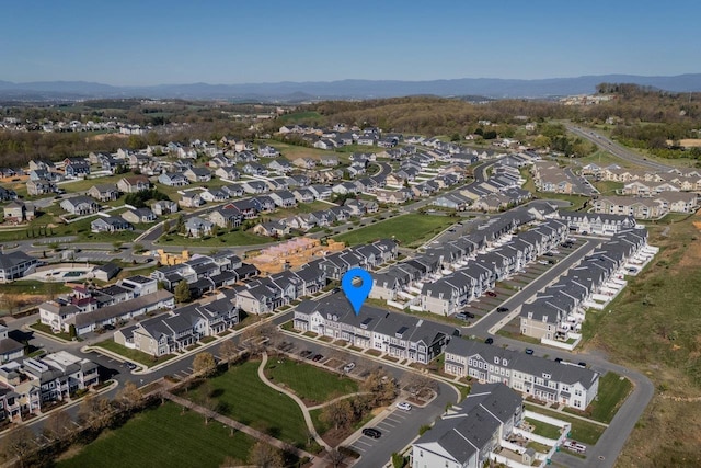 birds eye view of property featuring a residential view and a mountain view